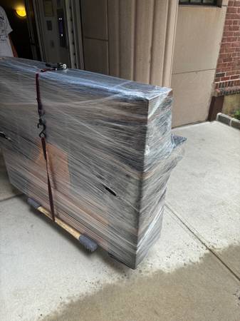 Wrapped and protected furniture ready for transport