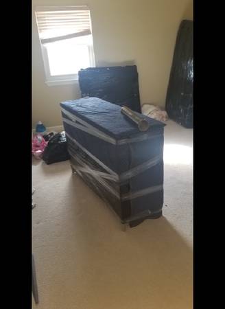 Professionally wrapped furniture for safe moving